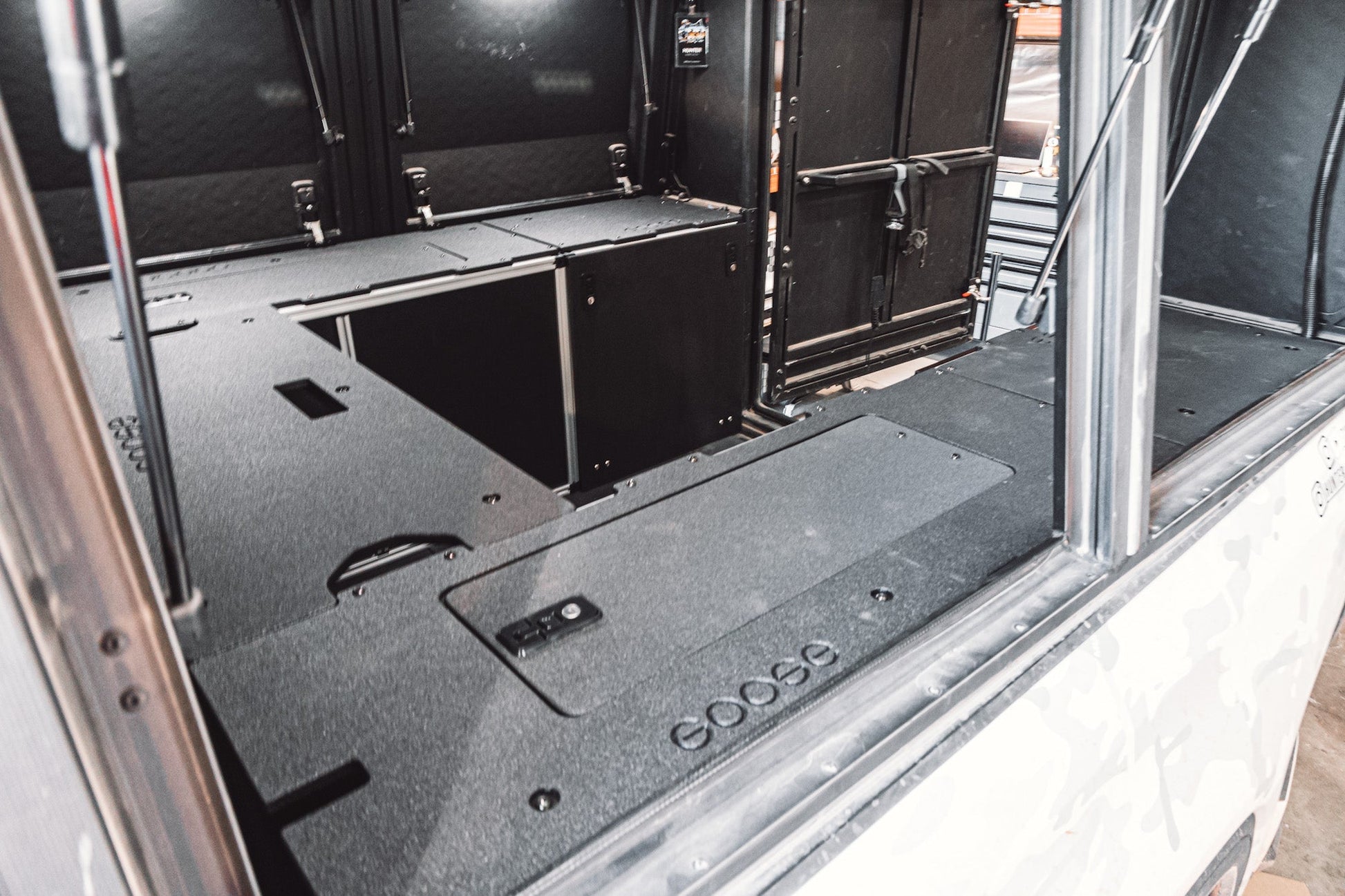 goose gear alu cab Goose Gear AluCab Alu-Cabin Canopy Camper - Chevrolet Silverado 1500 / GMC Sierra 1500 2019-Present 4th Gen. - Front Utility Module